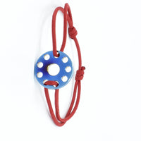 Bracelet en titane bleu et cordon rouge ∣ Bijoux Titane France