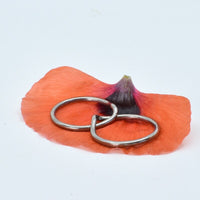 Magnifique anneaux en titane entrelacés ∣ Bijoux Titane France®