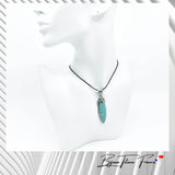 Pendentif unique en titane de couleur argent et véritable Turquoise ∣ Bijoux Titane France®